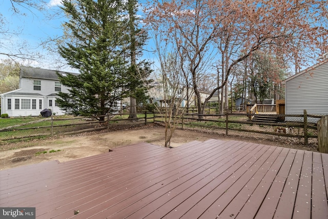 deck featuring a fenced backyard