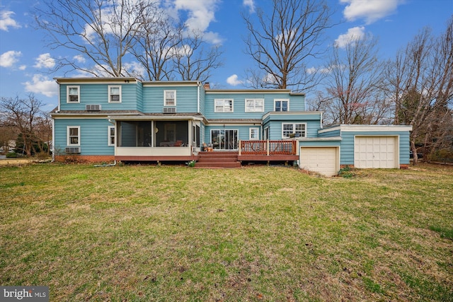 4507 Clermont Pl, Garrett Park, MD 20896 - back of property featuring a sunroom, a deck, and a lawn