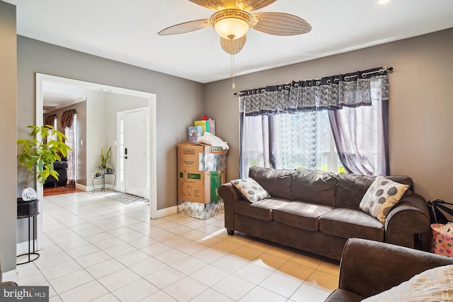 6301 Bradford Ct, Frederick, MD 21701 - living room featuring baseboards, a ceiling fan, and light tile patterned flooring