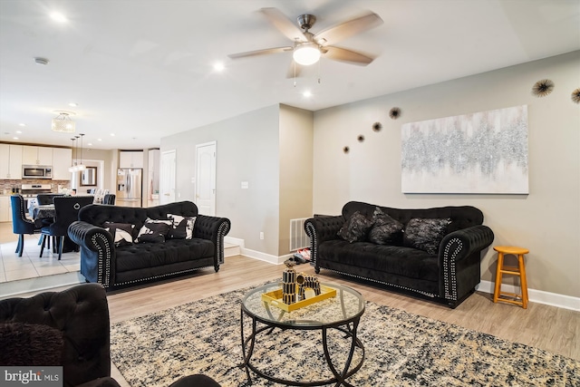 6301 Bradford Ct, Frederick, MD 21701 - living room with recessed lighting, light wood finished floors, baseboards, and ceiling fan