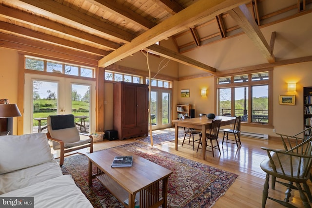 living area featuring light wood-style floors, wood ceiling, french doors, and beam ceiling