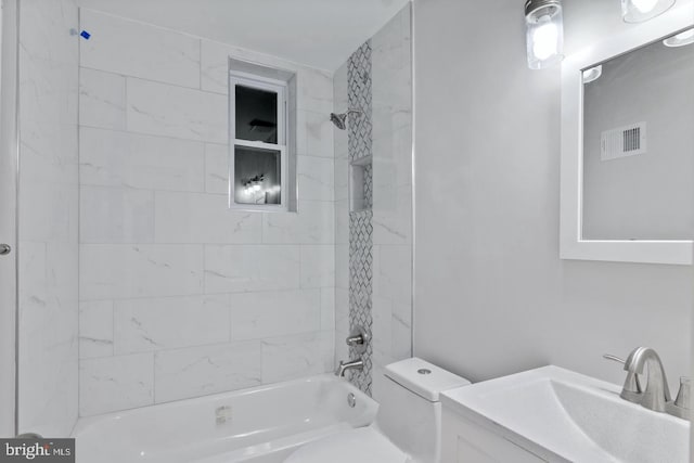 full bath with  shower combination, visible vents, toilet, and vanity