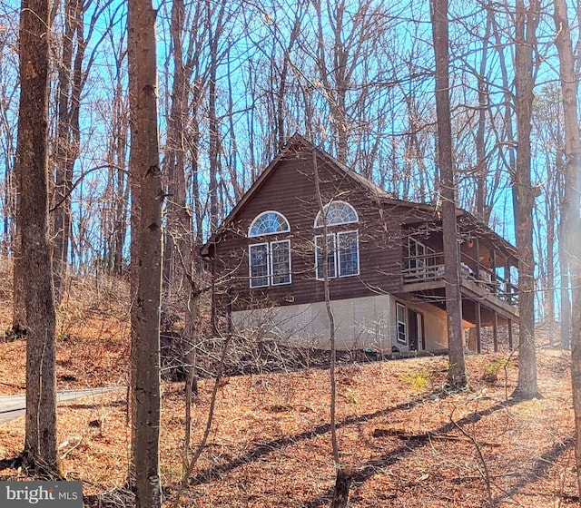4345 Rockford Rd, Great Cacapon, WV 25422 - view of home's exterior featuring a deck