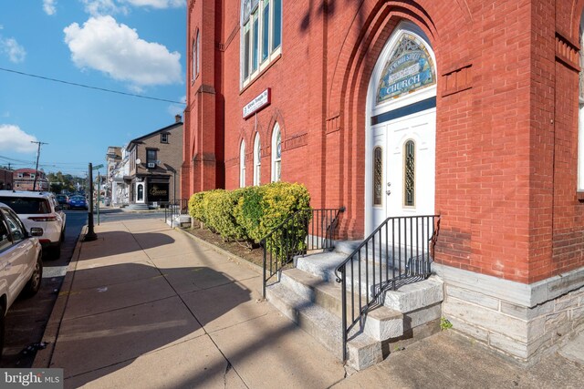 336 7th St N, Lebanon, PA 17042 - view of exterior entry featuring brick siding