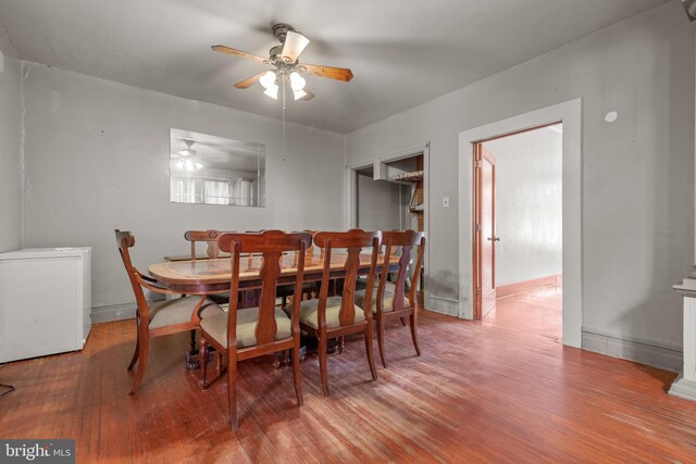 336 7th St N, Lebanon, PA 17042 - dining area featuring wood finished floors, a ceiling fan, and baseboards