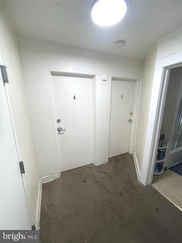 corridor featuring carpet