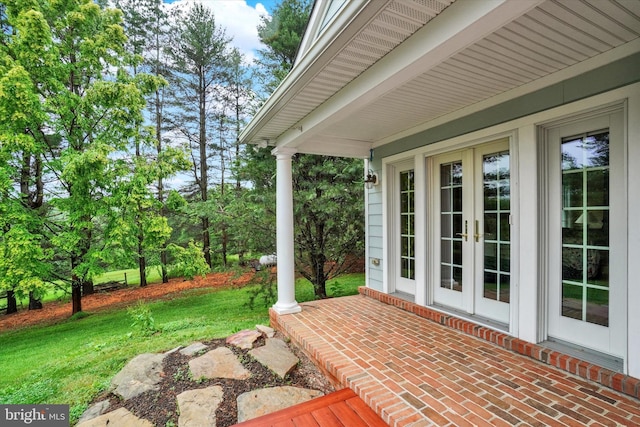 6 Deer Haven Ln, White Hall, MD 21161 - view of patio featuring french doors and view of wooded area