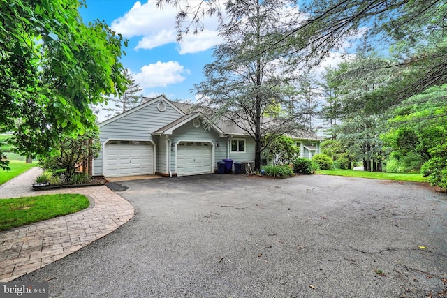 6 Deer Haven Ln, White Hall, MD 21161 - view of home's exterior with a garage and asphalt driveway