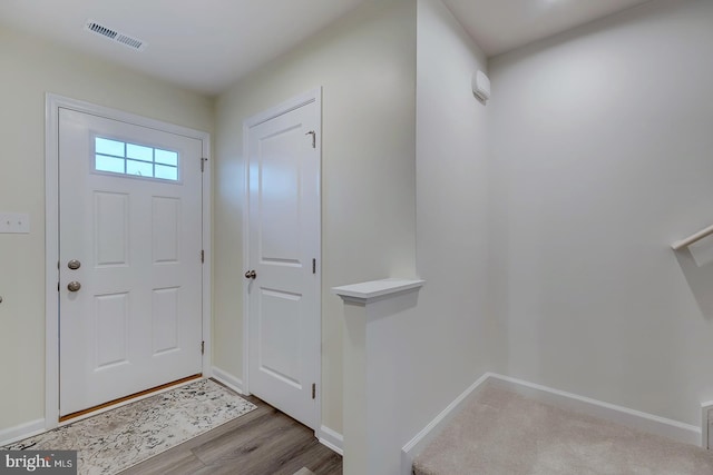 12086 Geyer Ave, Milford, DE 19963 - foyer entrance with wood finished floors, baseboards, and visible vents