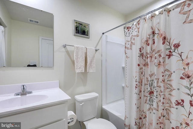 12086 Geyer Ave, Milford, DE 19963 - full bath featuring toilet, vanity, shower / bathtub combination with curtain, and visible vents