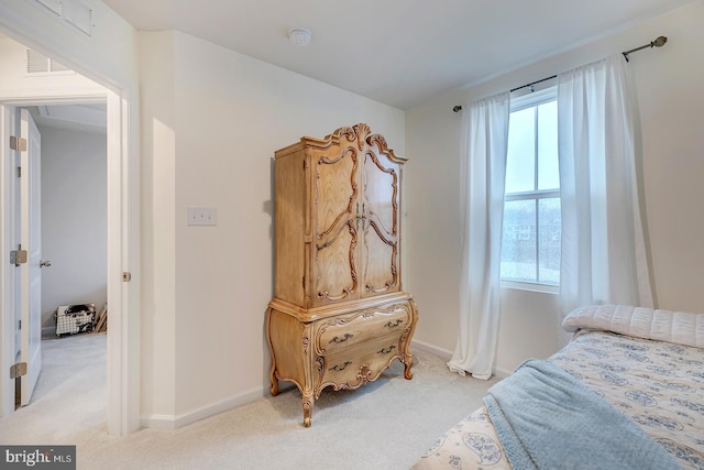 12086 Geyer Ave, Milford, DE 19963 - bedroom featuring baseboards, visible vents, and light colored carpet