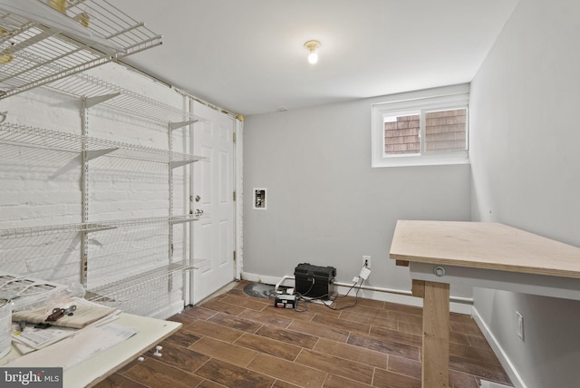 2804 Myrtle Ave NE, Washington, DC 20018 - clothes washing area featuring dark wood finished floors and baseboards