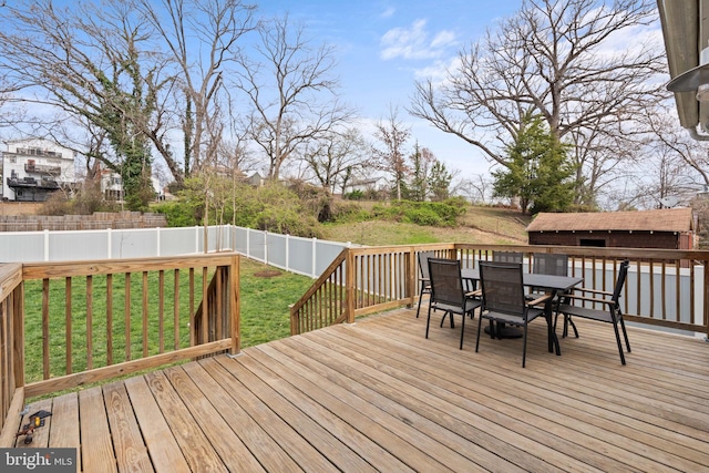 2804 Myrtle Ave NE, Washington, DC 20018 - wooden terrace with a lawn, outdoor dining space, and a fenced backyard