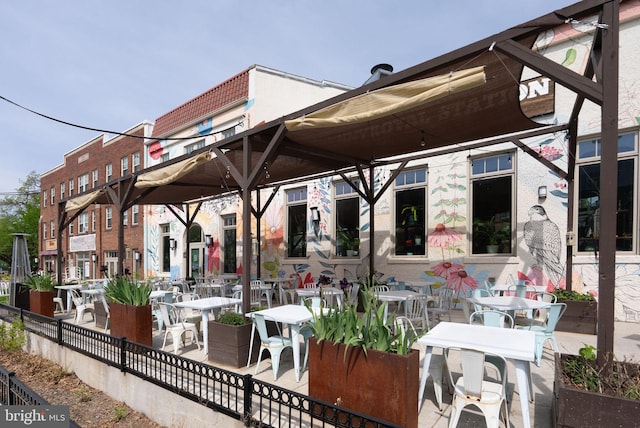 2804 Myrtle Ave NE, Washington, DC 20018 - view of patio featuring outdoor dining area and fence