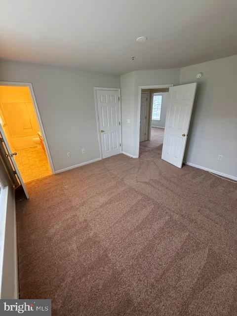 204 Carsons Ct, Pocomoke City, MD 21851 - unfurnished bedroom featuring baseboards and carpet