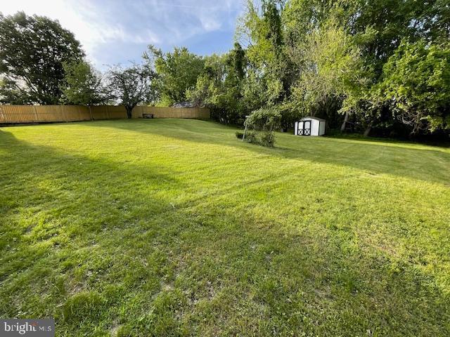 3433 Gregg Rd, Brookeville, MD 20833 - view of yard featuring a storage unit and an outdoor structure