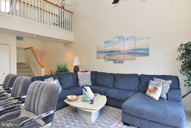 108 120th St Unit 5462, Ocean City, MD 21842 - living room featuring stairs, a high ceiling, and a ceiling fan