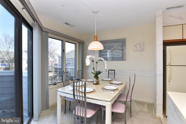 108 120th St Unit 5462, Ocean City, MD 21842 - dining area with light colored carpet and visible vents