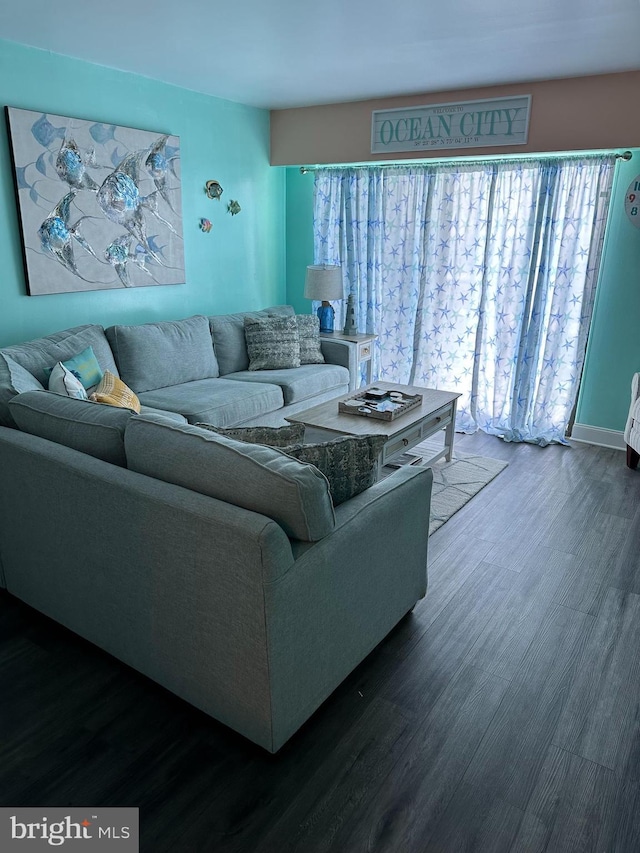 living room featuring dark wood-style floors
