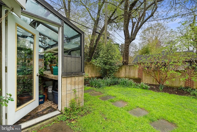 view of yard featuring fence