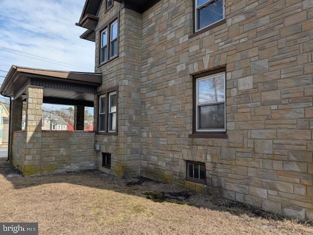view of home's exterior featuring stone siding