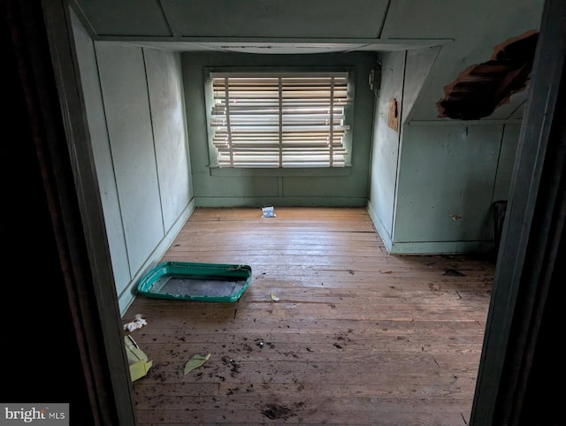 unfurnished room featuring wood-type flooring