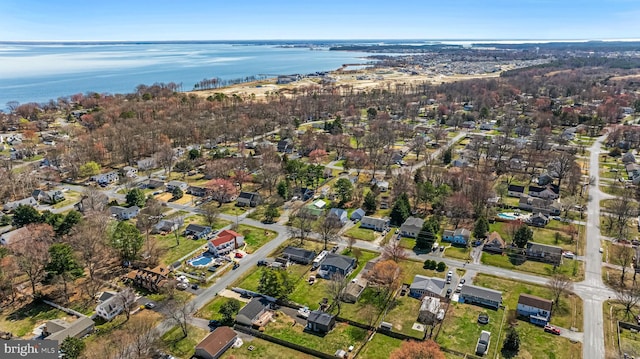 aerial view with a residential view and a water view