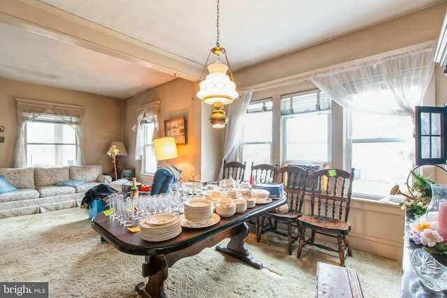 view of carpeted dining space