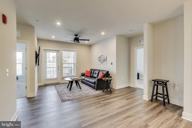 102 Saint Ives Unit 403, National Harbor, MD 20745 - living area with recessed lighting, visible vents, ceiling fan, and wood finished floors