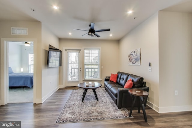 102 Saint Ives Unit 403, National Harbor, MD 20745 - living area featuring visible vents, dark wood-type flooring, and ceiling fan