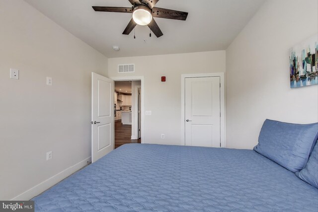 102 Saint Ives Unit 403, National Harbor, MD 20745 - bedroom with baseboards, ceiling fan, and visible vents
