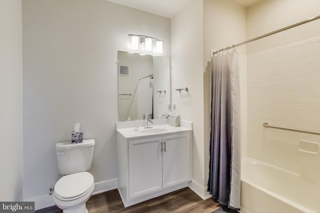 102 Saint Ives Unit 403, National Harbor, MD 20745 - full bathroom with vanity, toilet, baseboards, visible vents, and wood finished floors