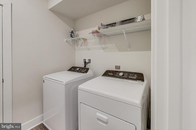 102 Saint Ives Unit 403, National Harbor, MD 20745 - laundry room featuring washer and dryer and laundry area