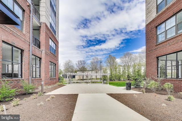 102 Saint Ives Unit 403, National Harbor, MD 20745 - view of home's community featuring a patio area