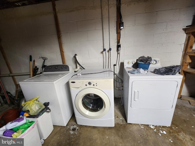 12114 Vale Smt, Frostburg, MD 21532 - laundry area featuring laundry area, concrete block wall, and washer and clothes dryer