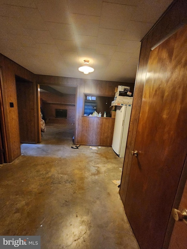 12114 Vale Smt, Frostburg, MD 21532 - corridor featuring concrete flooring, wooden walls, and washer / dryer