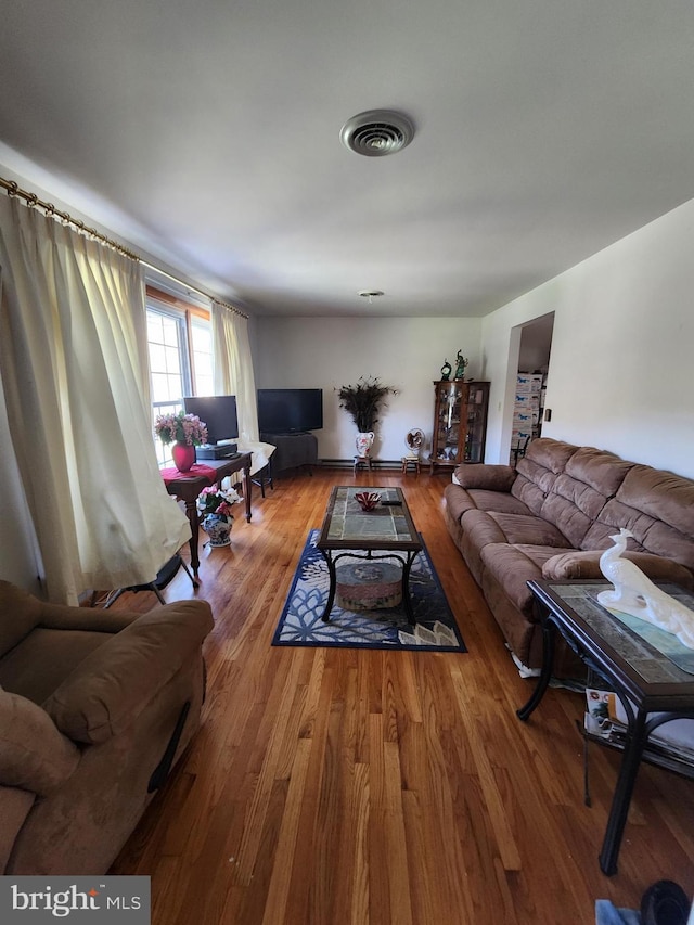 12114 Vale Smt, Frostburg, MD 21532 - living area featuring visible vents and wood finished floors