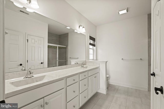 full bathroom featuring a sink, tile patterned flooring, baseboards, visible vents, and a stall shower