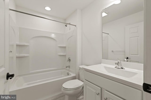 bathroom with vanity, toilet, and bathing tub / shower combination