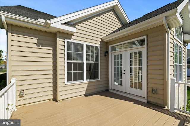 wooden deck featuring french doors