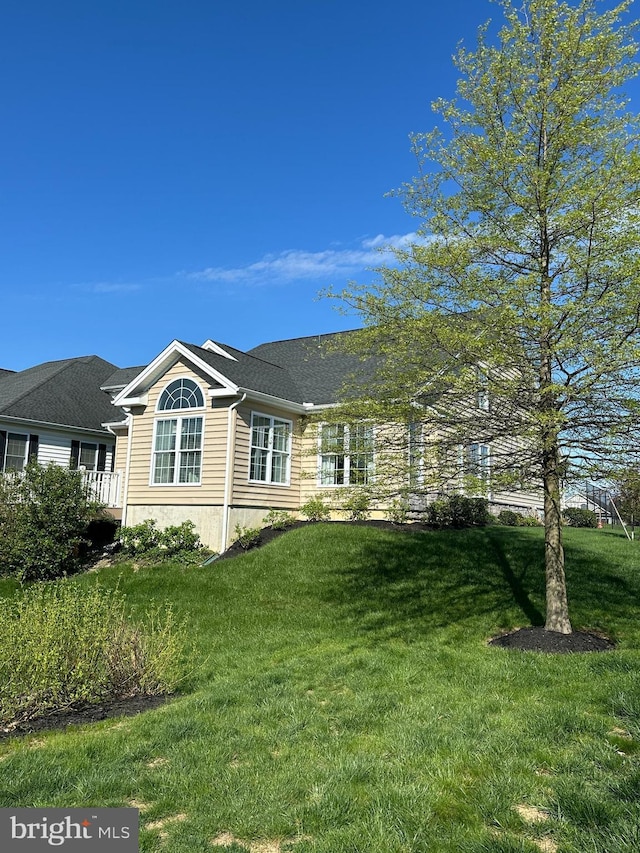 exterior space featuring a lawn