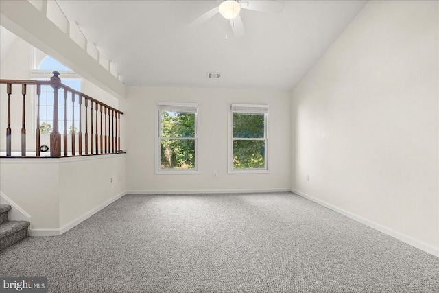 17 Alexandria Overlook Dr, Oxon Hill, MD 20745 - carpeted empty room featuring baseboards, visible vents, lofted ceiling, ceiling fan, and stairs