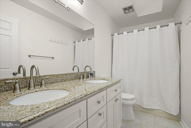 17 Alexandria Overlook Dr, Oxon Hill, MD 20745 - full bath featuring double vanity, visible vents, toilet, and a sink