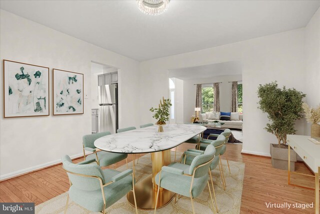 17 Alexandria Overlook Dr, Oxon Hill, MD 20745 - dining space featuring light wood-type flooring and baseboards