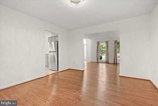 17 Alexandria Overlook Dr, Oxon Hill, MD 20745 - spare room with light wood-type flooring and baseboards
