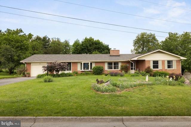 331 Ridge Ave, Winchester, VA 22601 - ranch-style house with brick siding, a garage, driveway, and a chimney