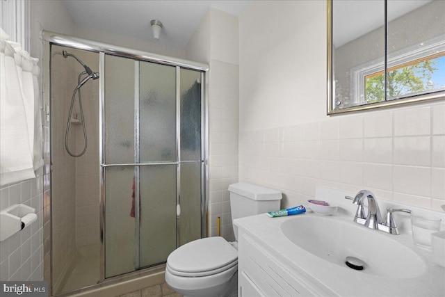 331 Ridge Ave, Winchester, VA 22601 - bathroom with a shower stall, vanity, and tile walls