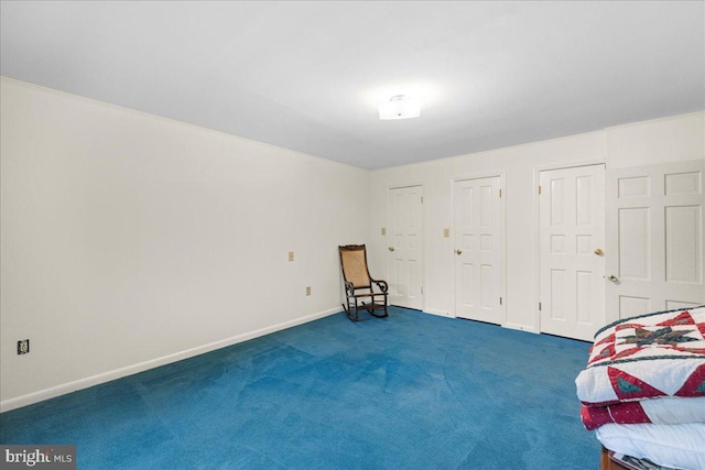 331 Ridge Ave, Winchester, VA 22601 - unfurnished bedroom featuring two closets and dark colored carpet