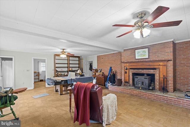 331 Ridge Ave, Winchester, VA 22601 - living area with a ceiling fan, crown molding, and a wood stove