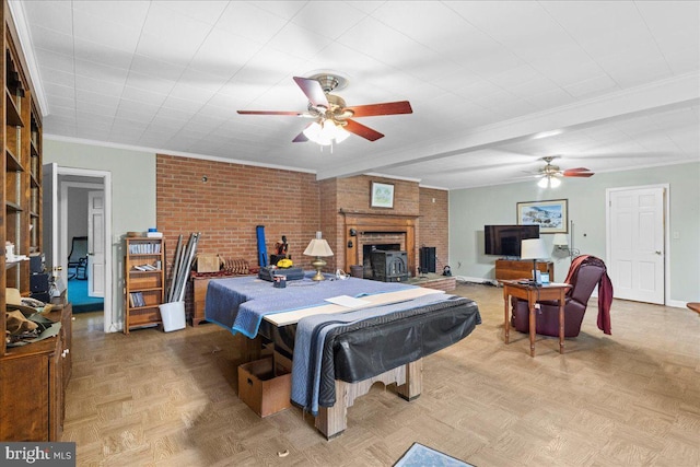 331 Ridge Ave, Winchester, VA 22601 - playroom featuring ceiling fan, a brick fireplace, crown molding, and beamed ceiling